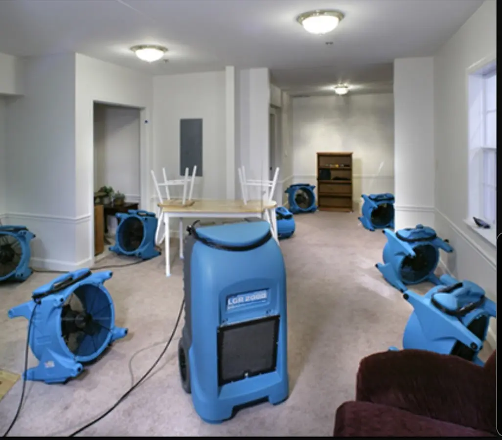 Air movers and dehumidifier setup for Water Damage Restoration in Tremonton